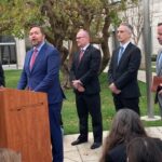 jeff-mitchell-ippei-outside-courthouse.jpg